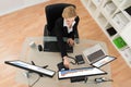 Businesswoman Analyzing Financial Data And Chart On Computer