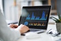 Businesswoman Analyzing Graph On Laptop Royalty Free Stock Photo