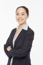 Businesswoman with arms crossed, smiling Royalty Free Stock Photo