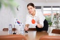 Businesswoman arranging the flags of South Korea and Japan for presentation and negotiations