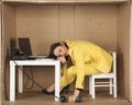 Businesswoman asleep during a telephone conversation