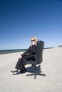 Businesswoman on beach Royalty Free Stock Photo