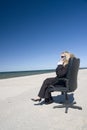 Businesswoman on beach Royalty Free Stock Photo