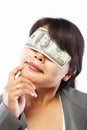 Businesswoman being blinded with money Royalty Free Stock Photo