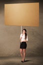 Businesswoman with blank cardboard Royalty Free Stock Photo