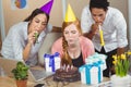 Businesswoman blowing candles Royalty Free Stock Photo