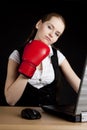 Businesswoman with a boxing glove Royalty Free Stock Photo