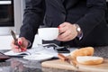 Businesswoman during the breakfast Royalty Free Stock Photo