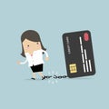 Businesswoman breaks free from the chain to bank credit card.