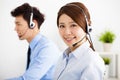 Businesswoman and businessman with headset working Royalty Free Stock Photo