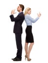 Businesswoman and businessman with imaginary guns Royalty Free Stock Photo