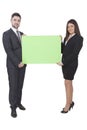 Businesswoman and businessman keeping signboard