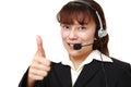 Businesswoman of call center with thumbs up gesture