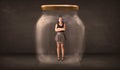 Businesswoman captured in a glass jar concept Royalty Free Stock Photo