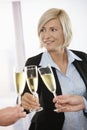 Businesswoman celebrating with champagne Royalty Free Stock Photo