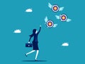 Businesswoman chasing a target that flies away from him. Failed goals and finding goals. business concept