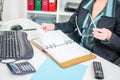 Businesswoman checking her diary Royalty Free Stock Photo