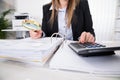 Businesswoman Checking Invoice With Magnifying Glass Royalty Free Stock Photo