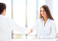 Businesswoman and client handshaking Royalty Free Stock Photo