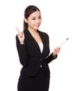 Businesswoman with clipboard and finger point up Royalty Free Stock Photo