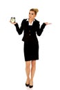 Businesswoman with clock - time concept Royalty Free Stock Photo