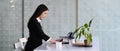 Businesswoman concentrate working on computer tablet at office.