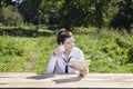 Businesswoman concentrated reading newspaper