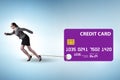 Businesswoman in the credit card debt concept