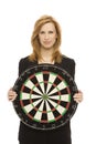 Businesswoman with dart board