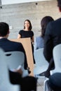 Businesswoman Delivering Presentation At Conference Royalty Free Stock Photo