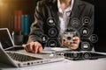 Businesswoman or Designer using mobile phone with laptop and digital tablet laptop and document on desk in office with virtual Royalty Free Stock Photo