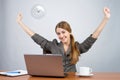 Businesswoman at desk with arms Royalty Free Stock Photo