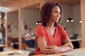 Businesswoman At Desk In Modern Office Work Space With Laptop Royalty Free Stock Photo