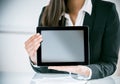 Businesswoman displaying a blank tablet