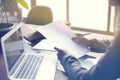 Businesswoman with documents paper sheet in loft modern office,Businesswoman with documents paper sheet in loft modern office, wor Royalty Free Stock Photo