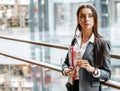 Businesswoman with documents for work. Student girl with folders with documentation. An officer will collect information