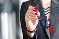 Businesswoman drawing a sign of sinking euro hanging on an a