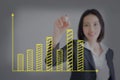 Businesswoman  drawing upward trend bar chart Royalty Free Stock Photo