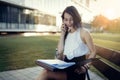 Businesswoman in dress outdoors Royalty Free Stock Photo