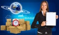 Businesswoman with Earth and heap of cardboard Royalty Free Stock Photo