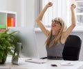 Businesswoman enjoying success at work Royalty Free Stock Photo