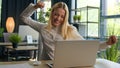 Businesswoman excited woman girl female winner working with laptop celebrate computer win online business success in Royalty Free Stock Photo