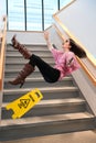 Businesswoman Falling on Stairs Royalty Free Stock Photo