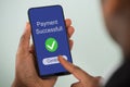 Person Showing Payment Successful Message On Cellphone Royalty Free Stock Photo