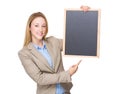 Businesswoman finger point to chalk board