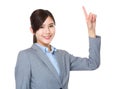 Businesswoman with finger point upwards Royalty Free Stock Photo