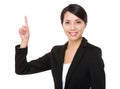 Businesswoman with finger point upwards Royalty Free Stock Photo