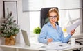 Businesswoman freelancer working at a computer at Christmas Royalty Free Stock Photo