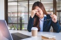 Businesswoman get stressed while having a problem at work