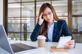 Businesswoman get stressed while having a problem at work